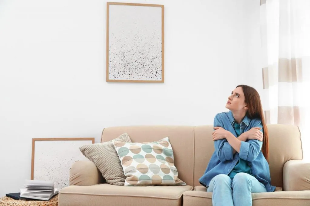 Woman feels cold because heating system failed to work properly