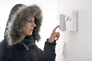 Homeowner turns on the furnace thermostat