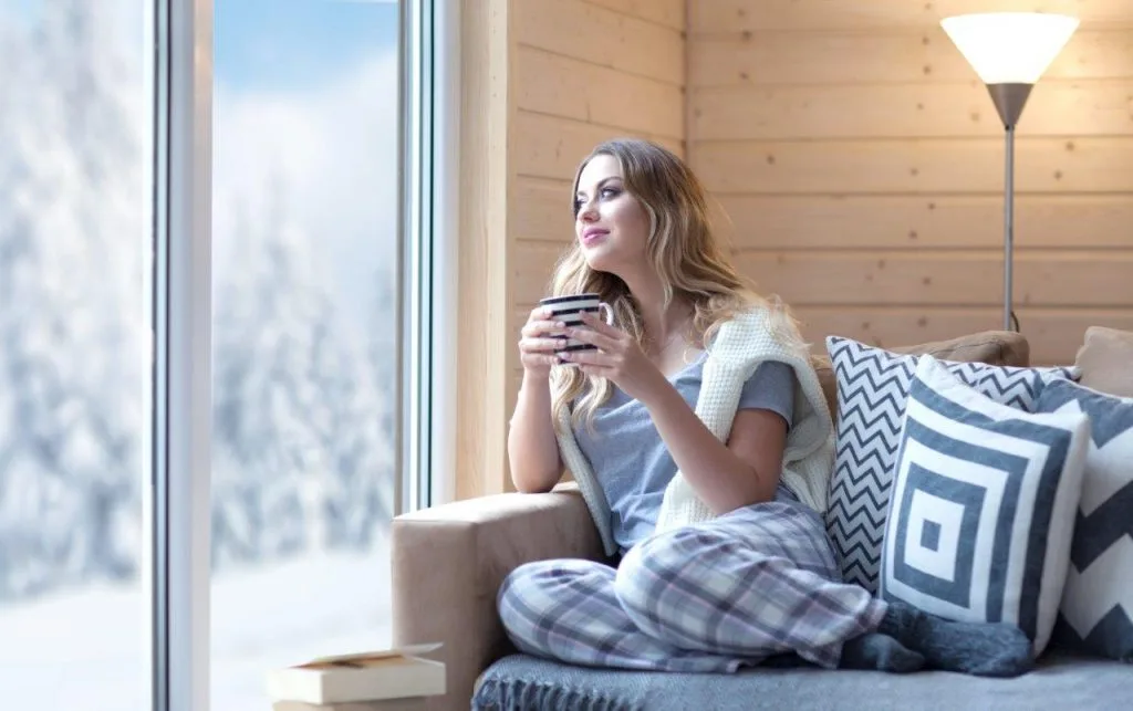 Homeowner is warm at home because of proper HVAC system maintenance